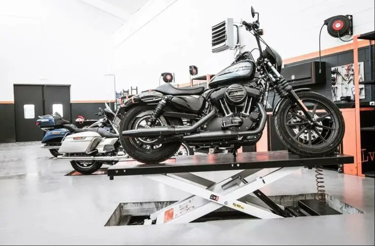 Are There Any Additional Accessories Or Features Recommended For A Motorcycle Lift Used With A Harley Davidson