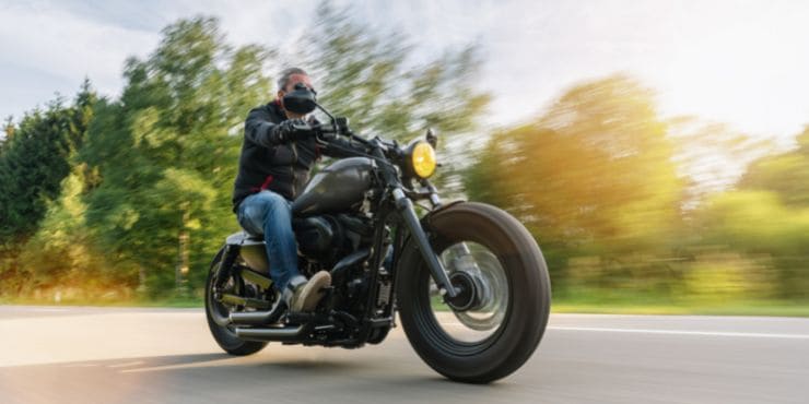 How Many Miles Per Gallon Does A Harley-Davidson Get 2 Professional Rider Driving A Harley-Davidson Motorcycle So Fast