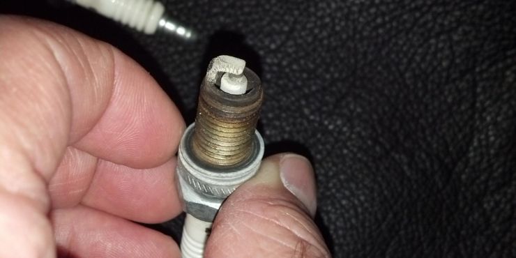 How Many Spark Plugs Does A Harley Have: Important Things To Know About Spark Plugs 3 Person Removing Harley Spark Plugs
