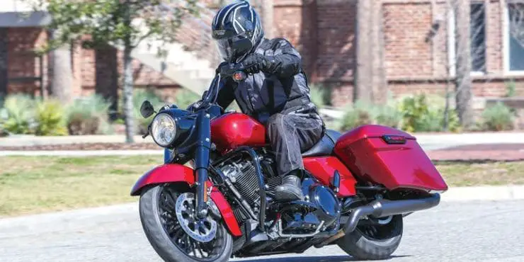 How Much Does A Road King Weight - Man Driving Road King Bike