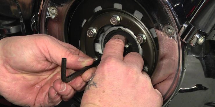 Person Adjusting Harley Bike Clutch