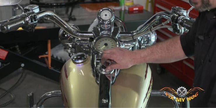 A motorcycle professional reprogramming Harley key fob