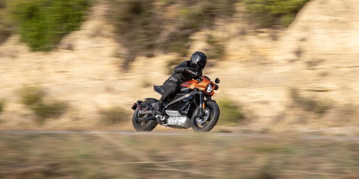 Professional Harley Davidson Rider Driving A Motorcycle So Fast