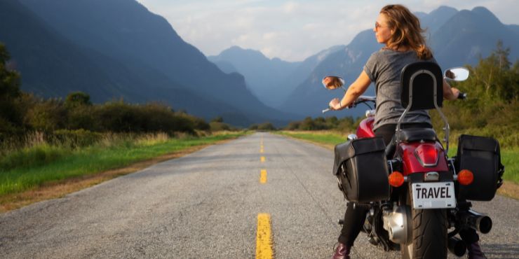 Woman Taking A Break Riding Harley-Davidson Motorcycle