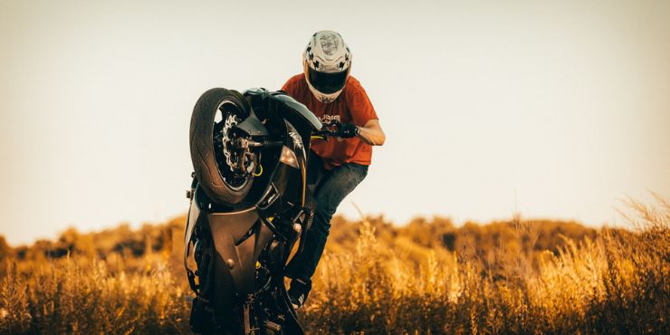 Professional Rider Trying To Wheelie Harley Davidson Bike