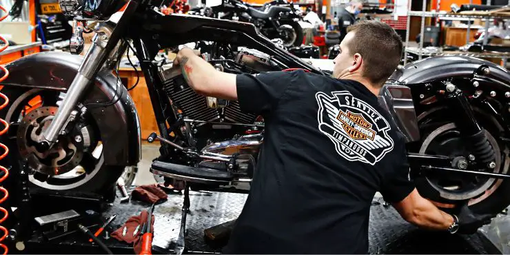 Person Assembling Harley-Davidson Motorcycle