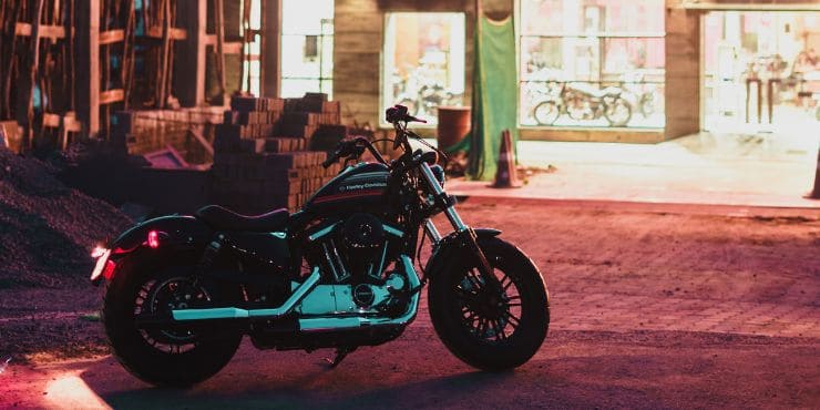 A Harley-Davidson Motorcycle Parked In Front Of Harley Building